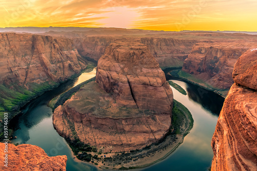 Horseshoe Bend on the Colorado River near to Page, Arizona with the sunset below the horizon