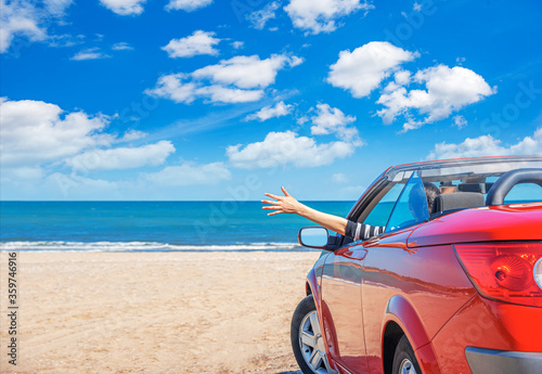 Red car on the beach. Vacation and freedom concept. © Denis Rozhnovsky