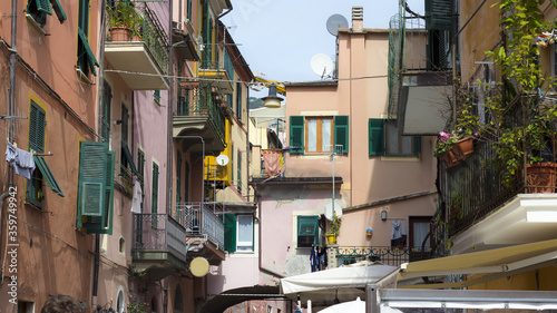 Cinque Terre scenic view of a colorful town buildings along a street in Monterosso al Mare in Italy