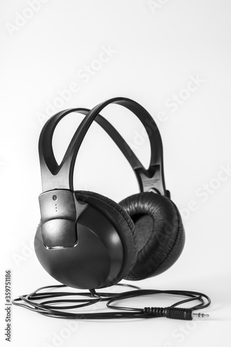 Black headphones on a white background