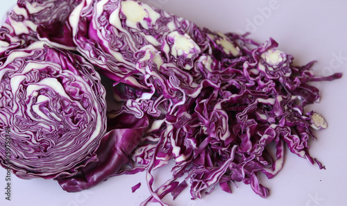 shredded red cabbage on a white background close up