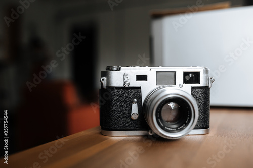 Vintage film camera on a white background. Horizontal.