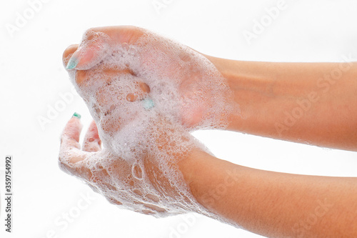 Washing hands with soap
