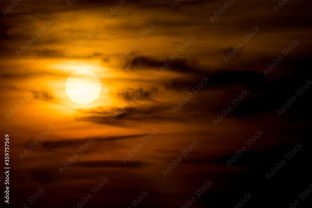 Sunset behind the clouds after rain Sunset behind the clouds after rain