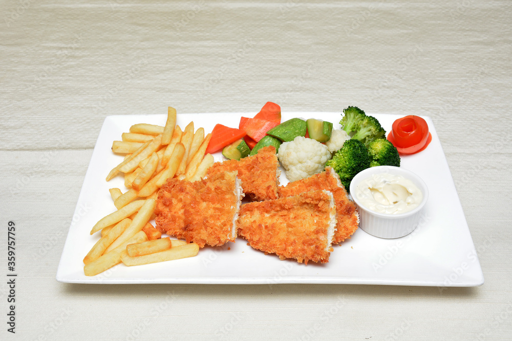 chicken fry with french fries and vegetable salad chicken fry with french fries and vegetable salad
