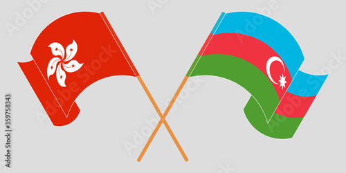 Crossed and waving flags of Azerbaijan and Hong Kong