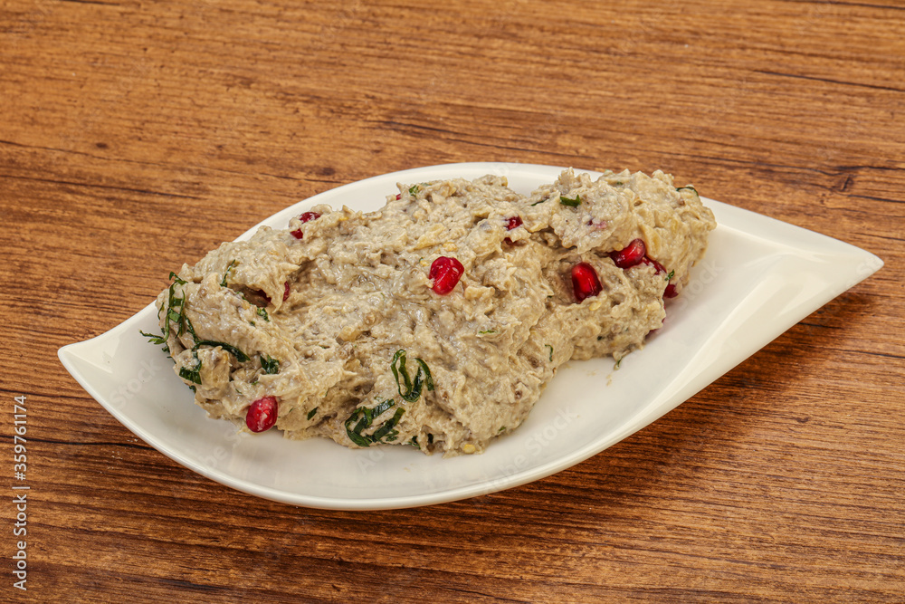 Vagan dietary cusine - mutabal with granet seeds