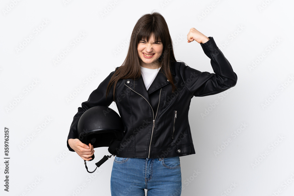 Woman holding a motorcycle helmet isolated on white background celebrating a victory Woman holding a motorcycle helmet isolated on white background celebrating a victory