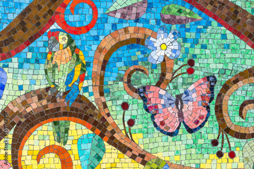 Colorful mosaic artwork close-up
Ceramic tiles pattern with flower and bird