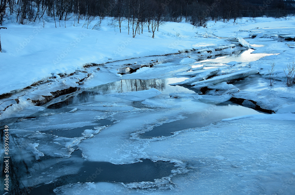 Fototapeta premium frozen river stream in winter