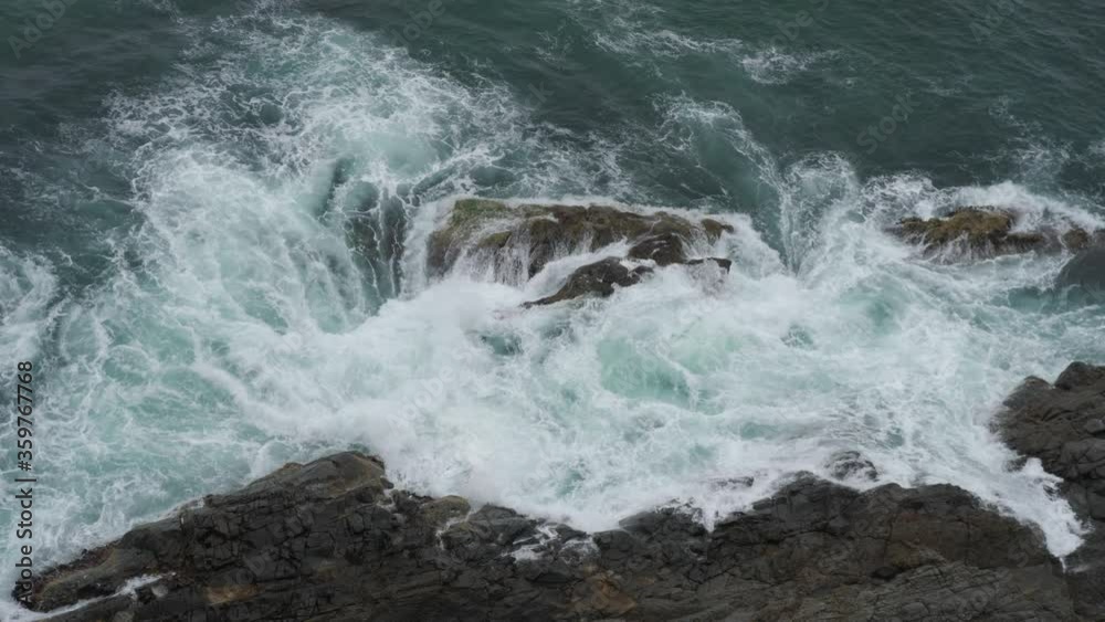 Waves Crashing into Cliff Walls Waves Crashing into Cliff Walls