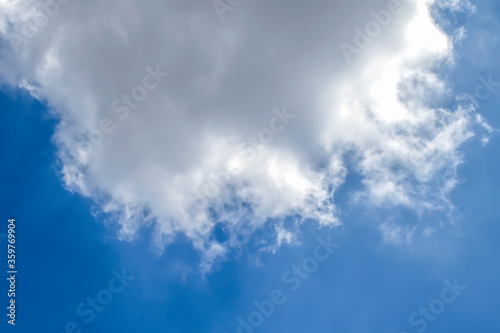 White clouds in the blue sky  sunny day