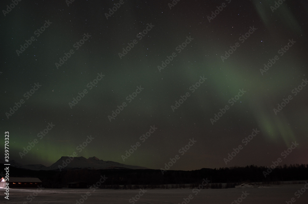 majestic aurora borealis over night sky
