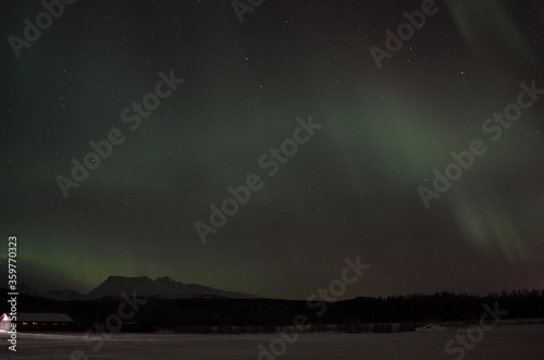 majestic aurora borealis over night sky © Arcticphotoworks