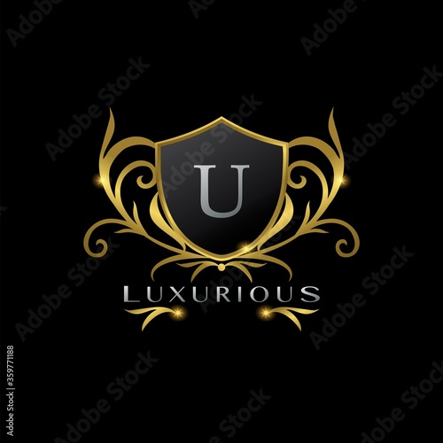 Golden Letter U Luxurious Shield Logo, vector design concept for luxuries business identity