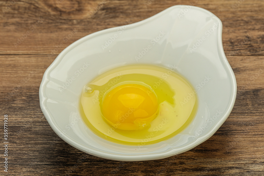 Raw Chicken egg in the bowl Raw Chicken egg in the bowl