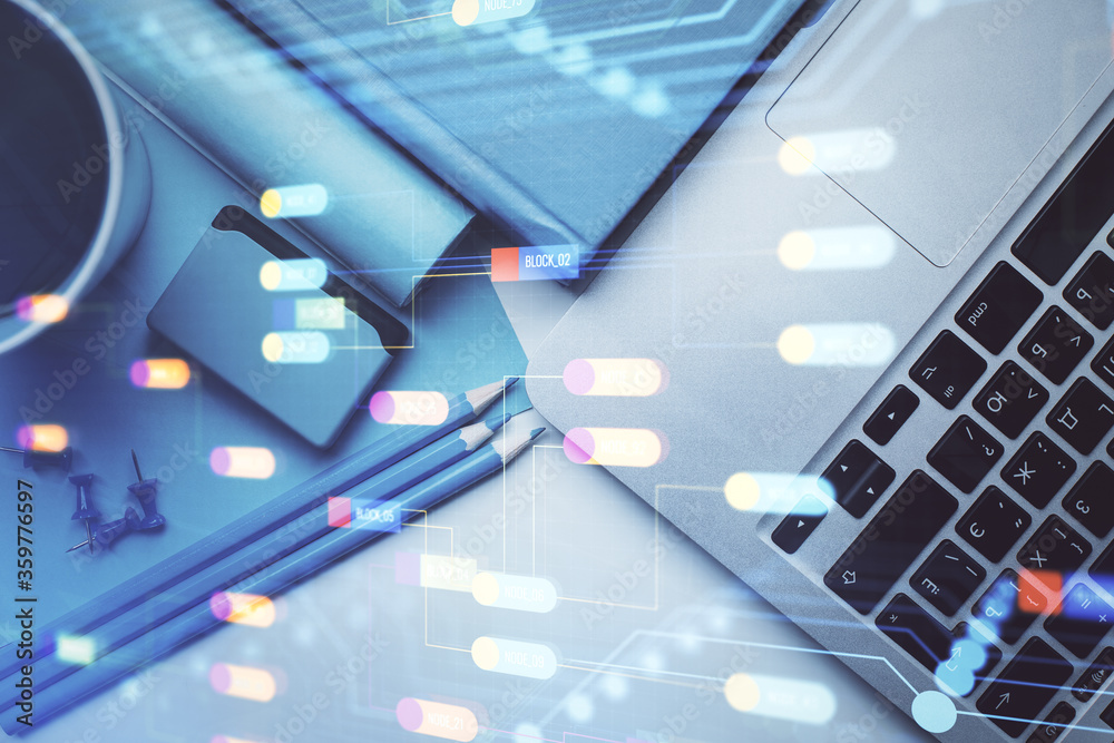 Naklejka premium Multi exposure of data drawing hologram over topview of study desk background with computer. Concept of technology.