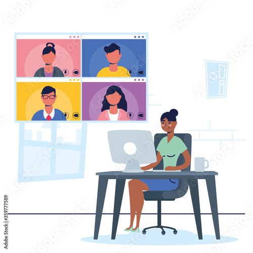 afro woman using desktop in virtual conference communication