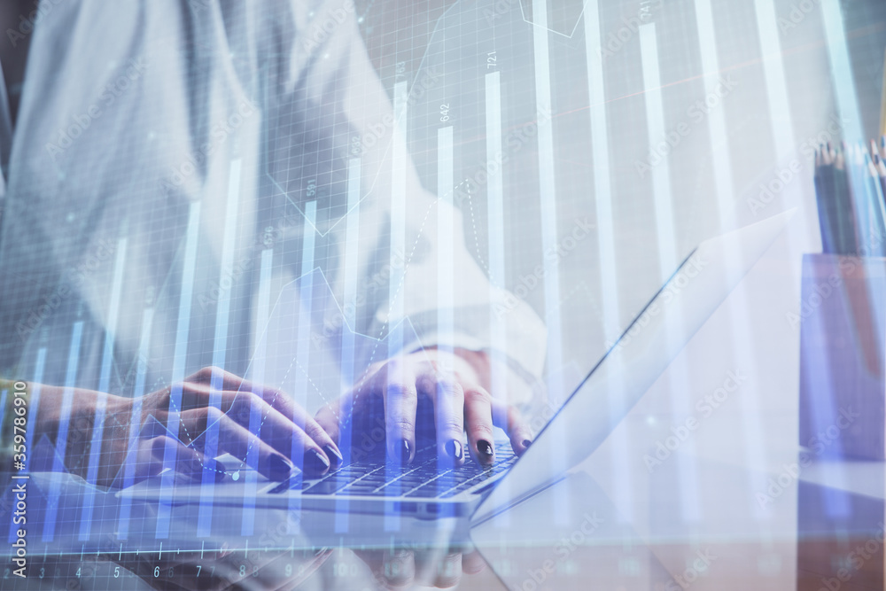 Double exposure of woman hands typing on computer and forex chart hologram drawing. Stock market invest concept. Double exposure of woman hands typing on computer and forex chart hologram drawing. Stock market invest concept.