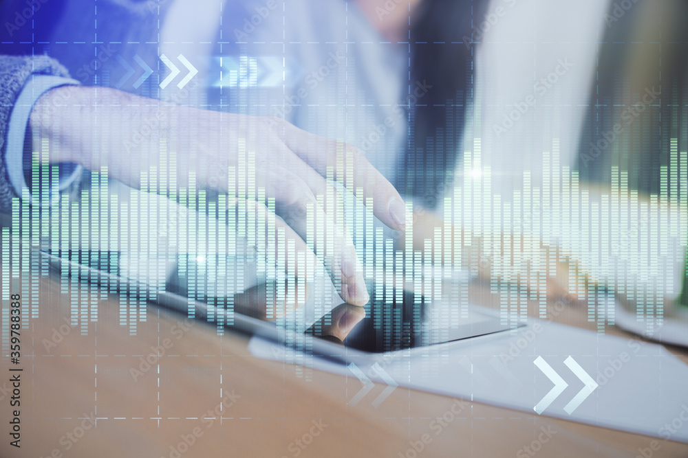 Double exposure of forex graph drawing and man and woman working together holding and using a mobile device. Trade concept. Double exposure of forex graph drawing and man and woman working together holding and using a mobile device. Trade concept.