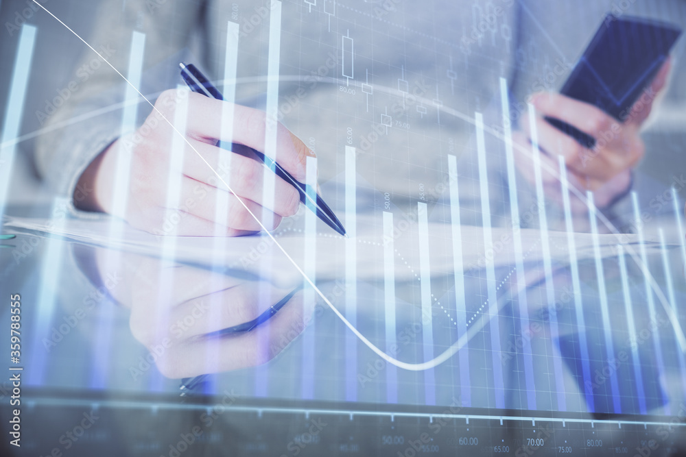 Double exposure of forex chart sketch hologram and woman holding and using a mobile device. Financial market concept. Double exposure of forex chart sketch hologram and woman holding and using a mobile device. Financial market concept.