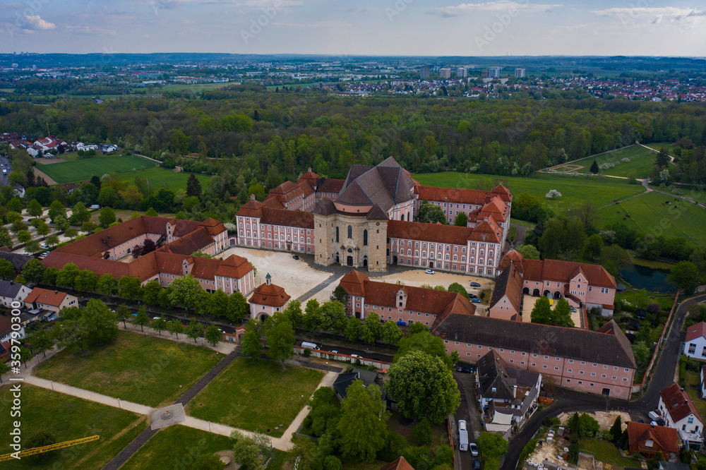 Aerial view of the city and monastery Wiblingen in Germany on a sunny spring day during the coronavirus lockdown.
