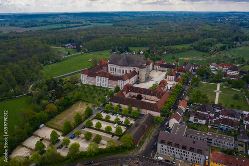 Aerial view of the city and monastery Wiblingen in Germany on a sunny spring day during the coronavirus lockdown. 