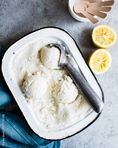 Scoops of lemon gelato in a baking dish. photo