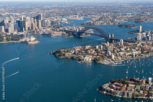 Sydney, NSW / Australia - June 21st 2019: Aerial view of Sydney Harbour from helicopter on a beautiful winters day