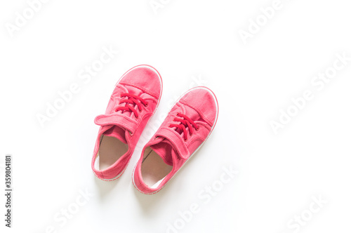 Sneakers pink white background. Copy spase