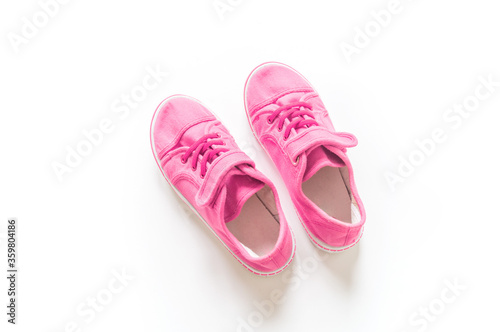 Sneakers pink white background. Copy spase