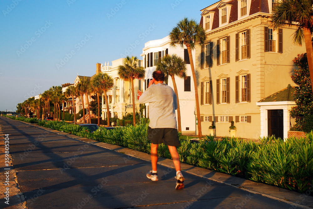 A Jogger Passes the Stately Antebellum Homes Along Charleston Waterfront