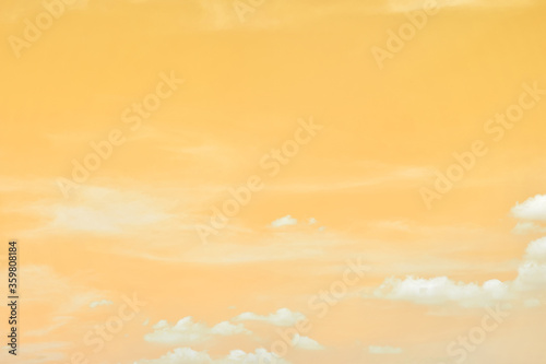 White clouds in the yellow sky at morning

