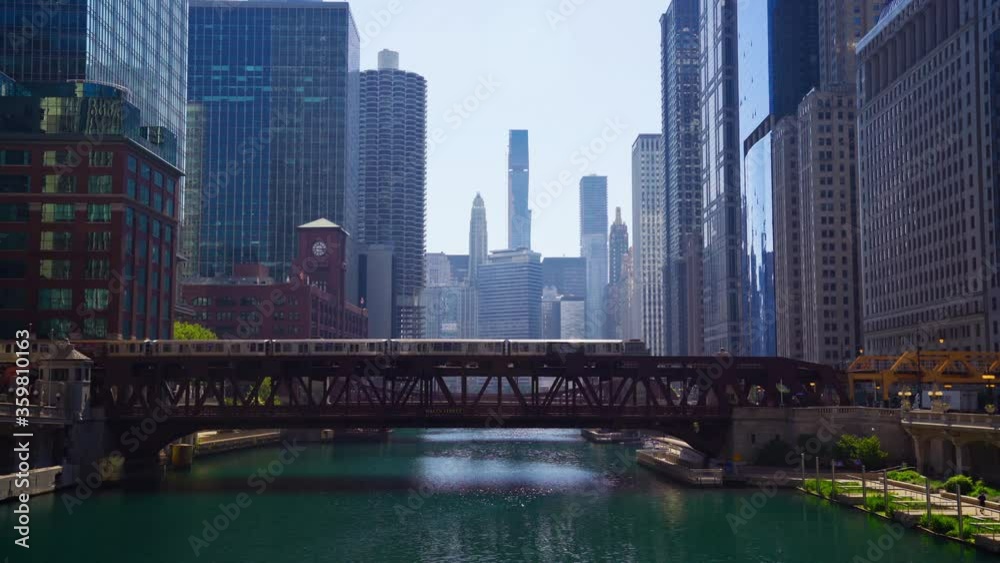 Chicago Elevated Train on Wells Street Bridge above the Chicago River and Surrounding Cityscape Skyscrapers