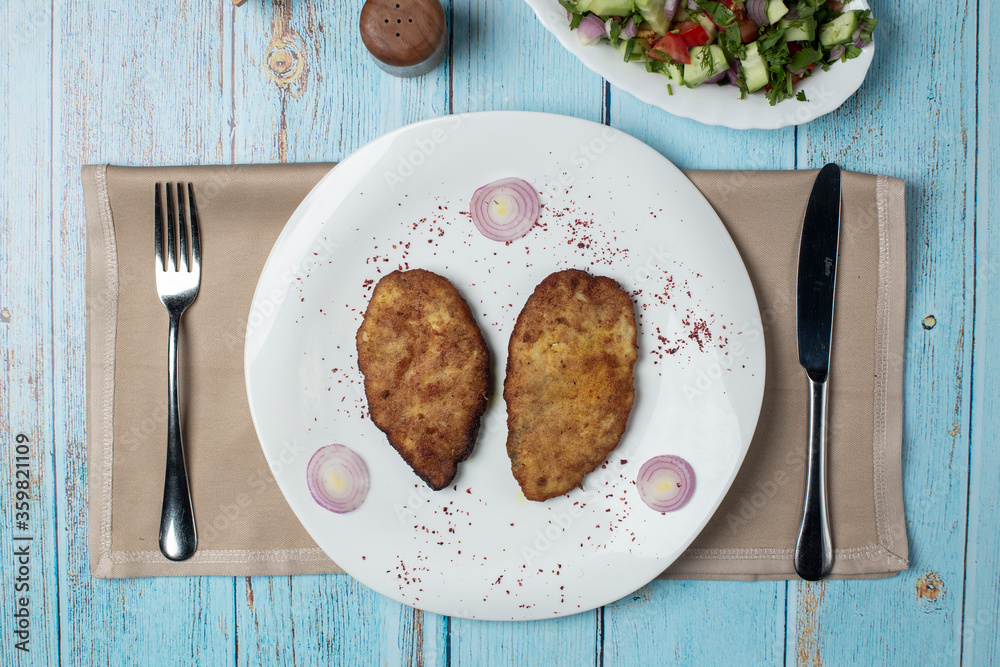 Chicken meat cotlets in a white plate Chicken meat cotlets in a white plate