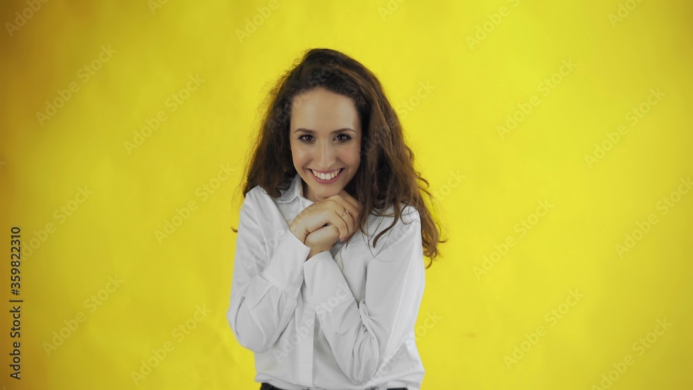 Beautyful woman is looking at camera flirting and smiling. Beautyful woman is looking at camera flirting and smiling.