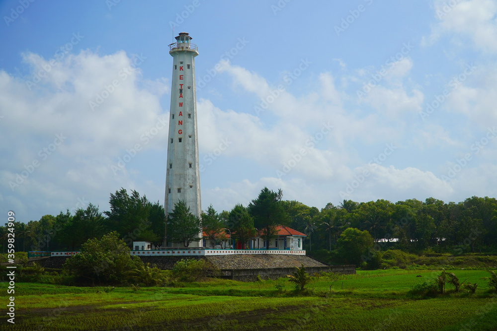 Magnificent old lighthouse on the beach Ketawang Purworejo Central Java Indonesia