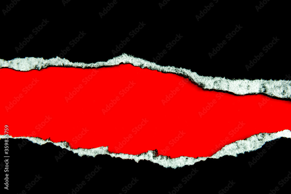 Black torn paper on a red background that is for copying advertisements or text, images and designs.