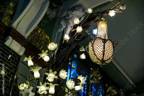 Ornate art deco light fixture at the famous grocery store Eliseevsky on Nevsky Prospect in Saint Petersburg, Russia photo