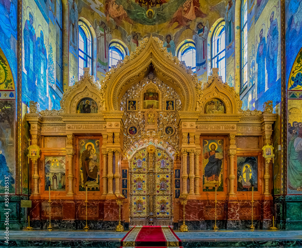 Ornate golden altar and icons of the Savior on Spilled Blood or Cathedral of Resurrection of Christ in Saint Petersburg, Russia