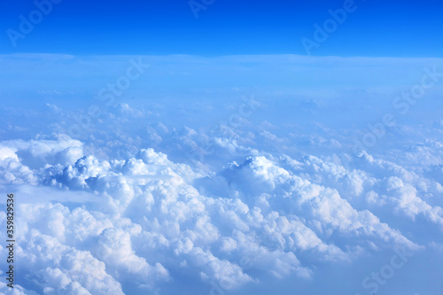 Clouds from above. View from airplane in sunny weather