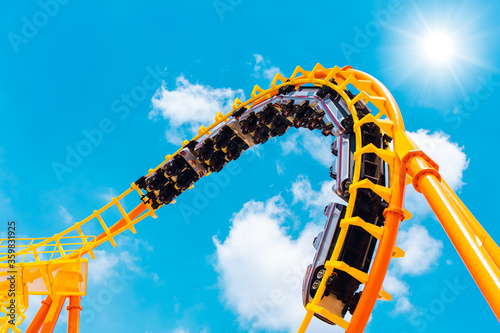 Rollercoaster railroad car no people testing track high to the sky roll bend and twist for exciting fun people at theme park during Coronavirus(Covid-19) pandemic photo