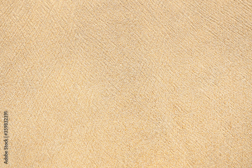 simply clean wet sand on the beach with scratch wave texture background