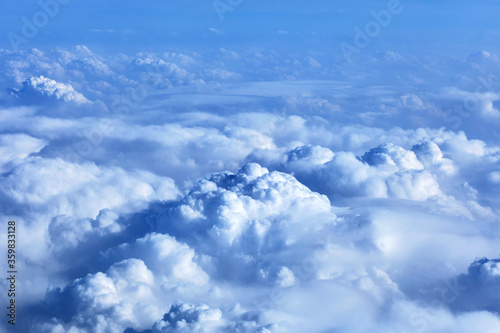 Clouds from above. View from airplane in sunny weather