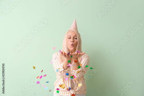 Mature woman celebrating Bi...