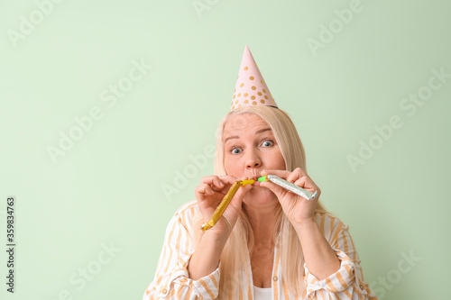 Mature woman celebrating Bi...