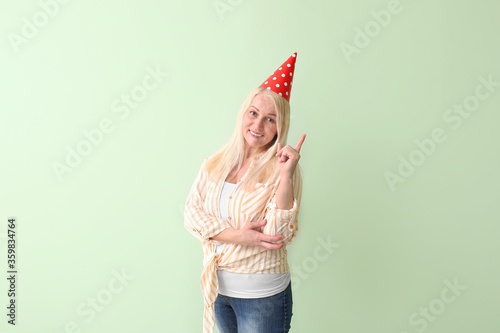 Mature woman celebrating Bi...