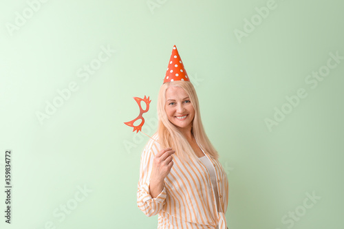 Mature woman celebrating Bi...