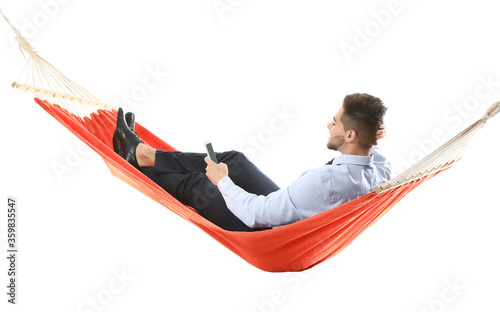 Young businessman with mobi...