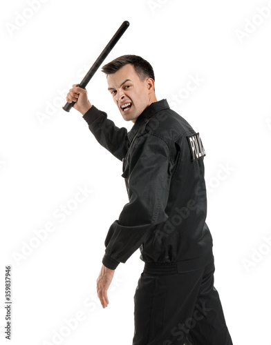 Aggressive police officer with baton on white background